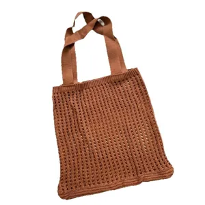 Handmade brown knit mesh hollow out tote bag with wide straps for casual summer use