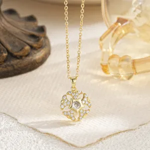 Close-up of rotating gold-plated eight-pointed star pendant with cubic zirconia