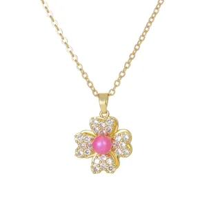 Vintage style rotatable four-leaf clover flower pendant necklace with pink central pearl