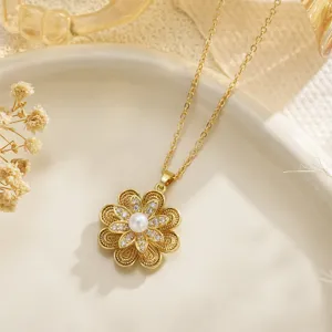 Close-up of rotatable gold daisy necklace with pearl and sparkling crystals detail