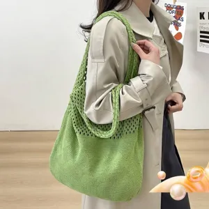 Elegante bolso de punto calado verde claro con un diseño clásico de tejido de diamante