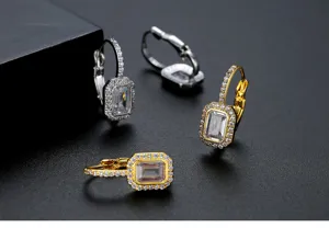 Vintage copper hoop earrings with emerald-cut cubic zirconia in gold and silver tones