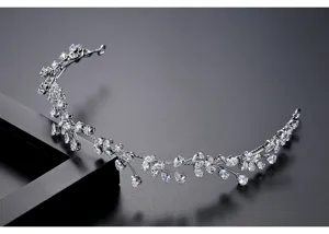 Elegant bridal tiara with sparkling teardrop-shaped zirconia stones on silver branch frame.