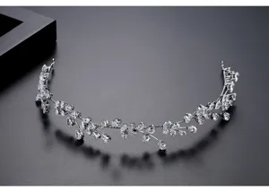 Elegant close-up of a silver bridal tiara with sparkling floral cubic zirconia
