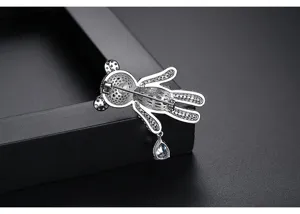 Detail view of the silver teddy bear brooch back showing the secure pin mechanism