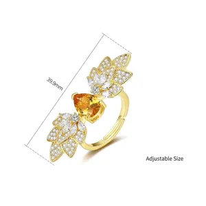 Eleganter verstellbarer Goldring mit birnenförmigem gelbem Kristall und Zirkonia Steinen