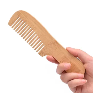 Natural eco-friendly bamboo wide tooth comb with handle for daily hair care and travel
