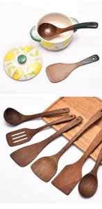Detailed view of natural wenge wood kitchen utensils including varied spatulas and ladles