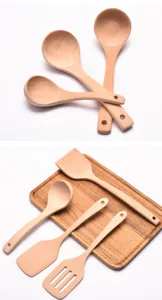 Professional beechwood kitchen utensil set with natural wood grain detail and smooth finish