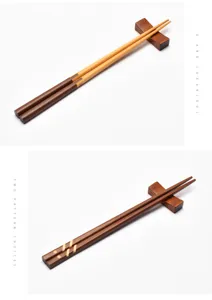 Detail of Japanese style wooden chopsticks with elegant striped patterns and wood rests