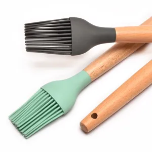 Silicone basting brushes with wooden handles for baking and BBQ, grey and mint green.