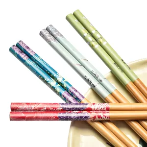 Set di quattro paia di bacchette in bambù carbonizzato da 24 cm con motivi floreali