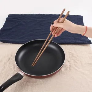 Extra long 42cm chicken wing wood chopsticks for frying and hot pot usage macro view