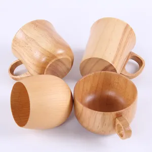 Set of 4 Japanese style natural wooden mugs with ergonomic handles in assorted shapes.