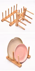 Macro detail view of natural bamboo plate rack holding ceramic dishes for kitchen organization