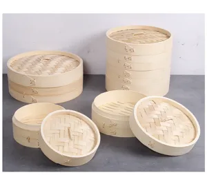 Macro detail of traditional stackable bamboo steamers with intricate woven lids and natural textures