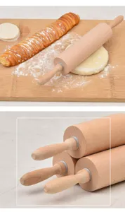 Détail d'un rouleau à pâtisserie en bois de hêtre avec poignées pour la boulangerie
