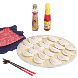 Tapete redondo de bambú para cocinar, secar y servir albóndigas hechas a mano en la cocina