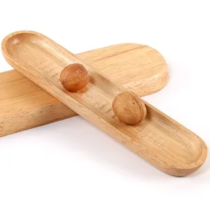 Élégant plateau en bois ovale de style japonais pour snacks et fruits secs sains