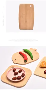 Selection of bamboo cutting boards in various shapes for kitchen food preparation