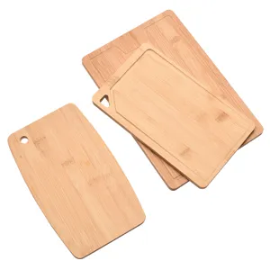 Set of three durable natural bamboo cutting boards for kitchen fruit and baby food prep