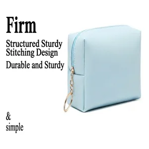 Detail view of light blue PU leather cosmetic bag with gold-tone ring zipper pull