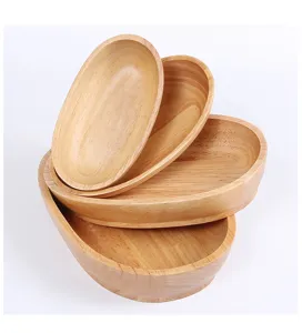 Stacked set of four Japanese-style boat-shaped wooden trays for snacks and fruit