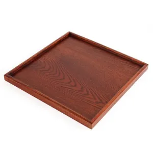 Square dark brown wooden serving tray with natural grain for tea or coffee.