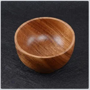 Premium handcrafted acacia wood bowl with natural grain in a Japanese minimalist style