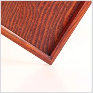 High-quality close-up of square wooden tray with elegant natural wood grain texture