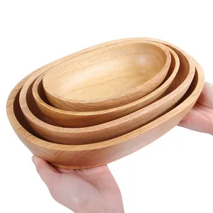 Set of 4 Japanese-style boat-shaped wooden serving trays for fruit and dry snacks