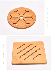 Macro view of circular and square hollow bamboo heat insulation trivets for table protection