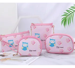 Details of four pink mini pouches with cute owl and fruit print for coins and earphones