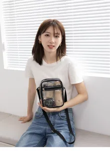 Stylish transparent PVC waterproof crossbody makeup bag shown on an Asian female model