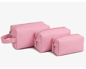 Set van drie roze waterdichte PU-make-uptassen in verschillende maten voor reizen