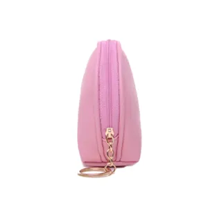 Mini borsa cosmetica rosa a conchiglia con cerniera e anello portachiavi dorato