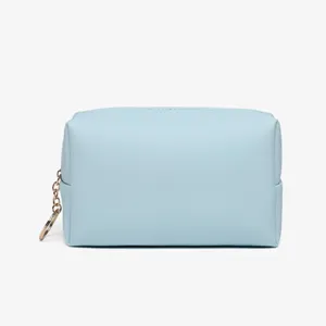 Borsa cosmetica portatile in pelle PU azzurra con trama a grana incrociata per viaggi