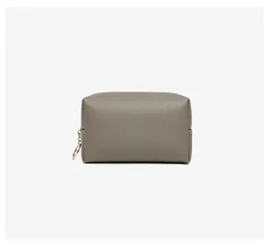 Detailed view showing the gray Saffiano cross-hatch texture on a square PU makeup bag