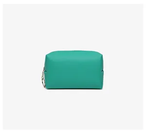 Detailed view of teal PU leather cosmetic bag with Saffiano texture and gold ring zipper