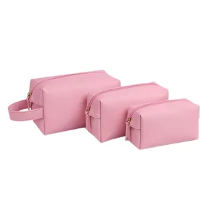 Set van drie roze waterdichte PU-leren make-uptassen voor op reis