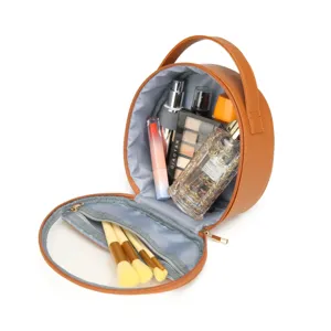 Round brown leather travel cosmetic bag with handle for makeup brushes and toiletries