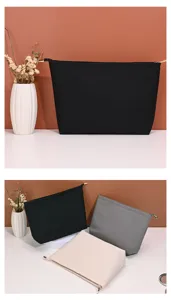 Bolsas de cosméticos minimalistas de nailon negro, gris y crema con cierre de cremallera