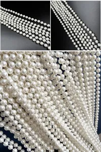 Close-up macro view of 10mm white imitation pearl bead chains for wedding and DIY decoration