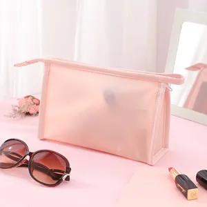 Elegant pink semi-transparent PVC waterproof cosmetic bag for travel and toiletries