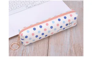 Detail view of white PU pencil case featuring blue and pink polka dots with metal keychain