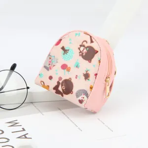 Mini pink shell-shaped coin purse with cute cartoon animal print and gold zipper