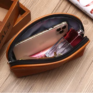 Elegante braune Kosmetiktasche mit Webmuster, tragbare Tasche für Hautpflege und Handy