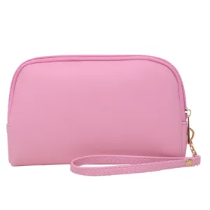 Pequeño neceser rosa de cuero PU impermeable con correa de mano para el viaje y monedas