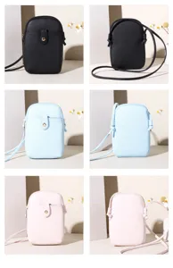 Minimalist multi-color crossbody phone pouches in black, light blue, and pink leather.
