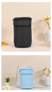 Cylinder-shaped PU leather crossbody cell phone bag in black and light blue variants